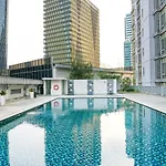 Modern And Comfortable 2Br At The Masterpiece Condominium Epicentrum Apartment By Travelio